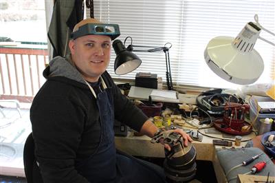 Hunter at his engraving station in the studio.